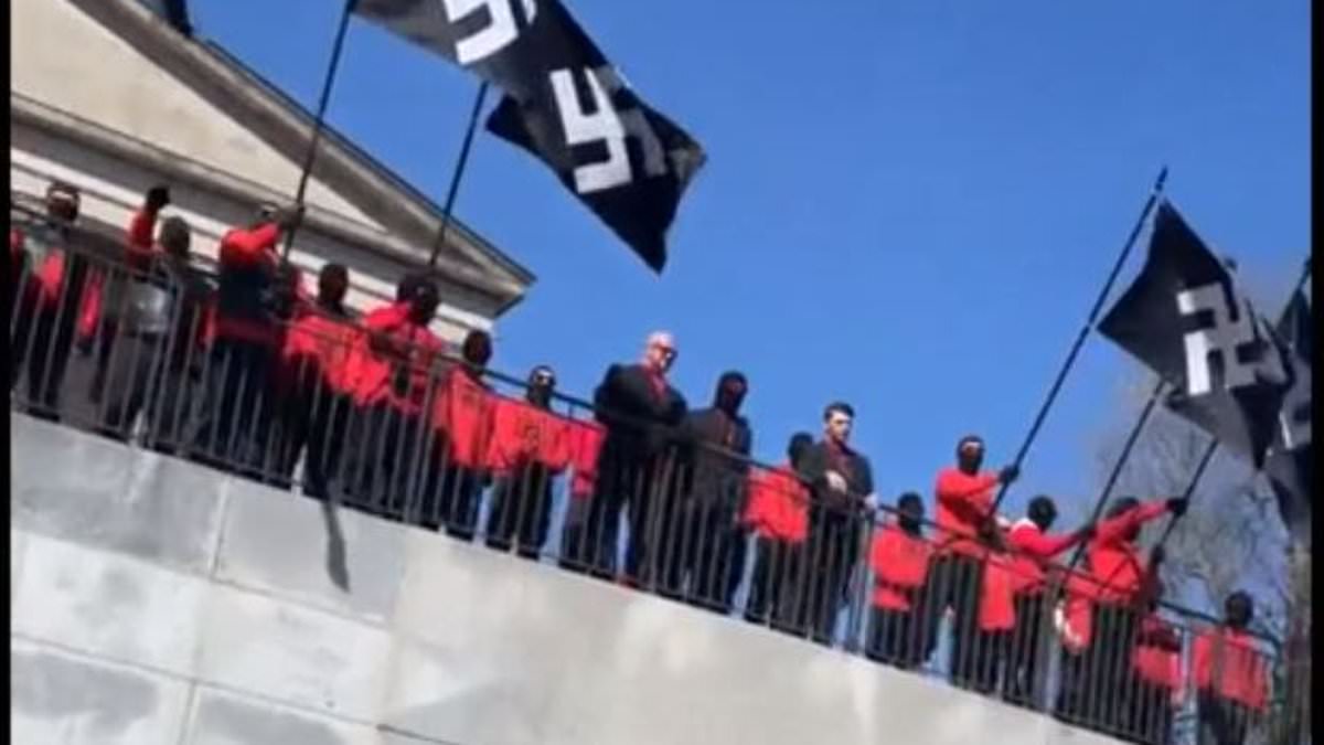 alert-–-nazi-flags-are-flown-on-steps-outside-tennessee-capitol-building-as-locals-are-outraged-over-white-supremacy-march-in-nashville