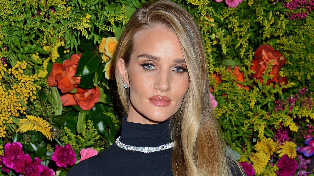 alert-–-rosie-huntington-whiteley-turns-heads-in-a-racy-black-semi-sheer-skirt-and-bodysuit-as-she-attends-the-british-vogue-x-tiffancy-&-co-baftas-party