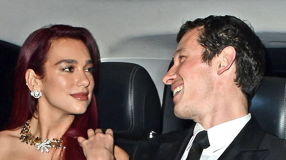 alert-–-dua-lipa-and-callum-turner-put-on-a-smitten-display-as-they-cement-their-a-list-couple-status-while-leading-the-glamorous-exits-from-star-studded-vogue-baftas-afterparty