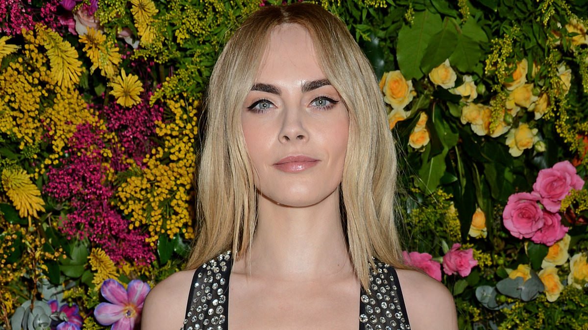 alert-–-braless-cara-delevingne-turns-heads-in-a-racy-plunging-semi-sheer-black-dress-as-she-attends-the-star-studded-vogue-bafta-afterparty