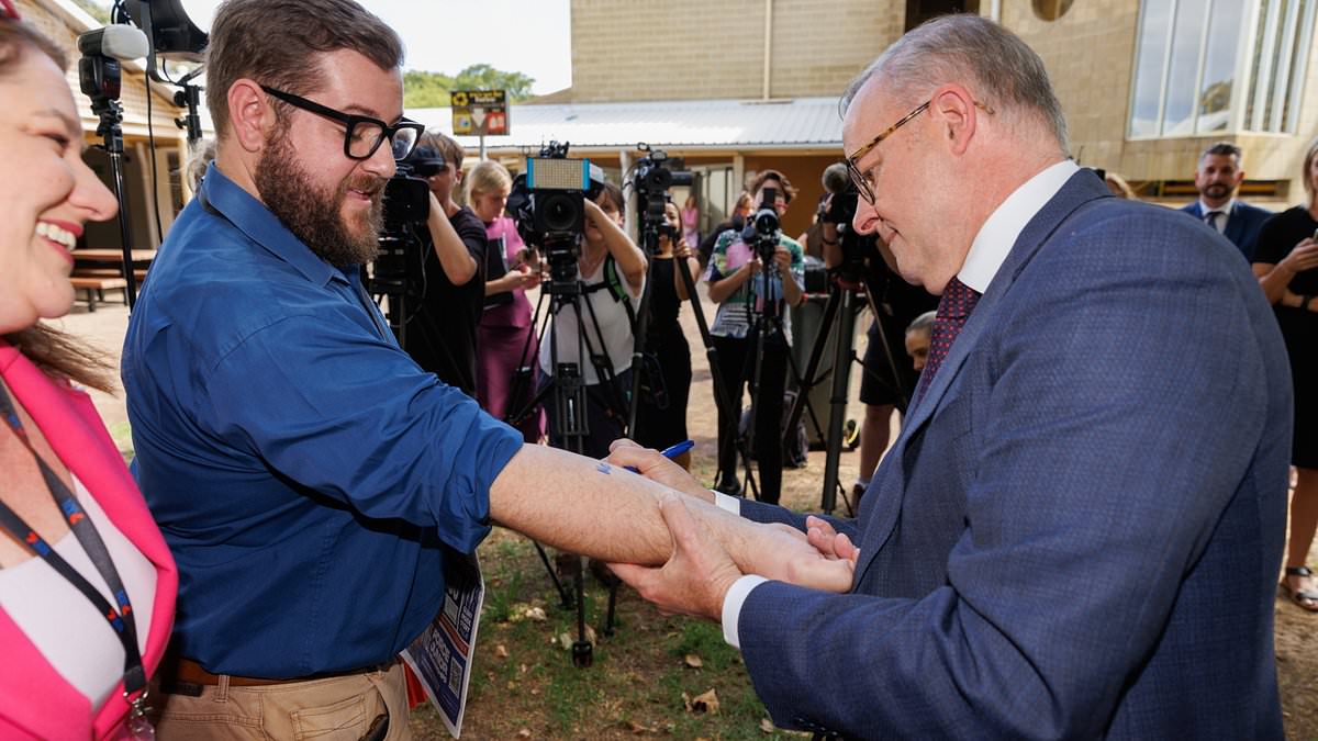 alert-–-anthony-albanese’s-gst-‘tattoo’-stunt-slammed-after-broken-election-promise-on-tax-cuts