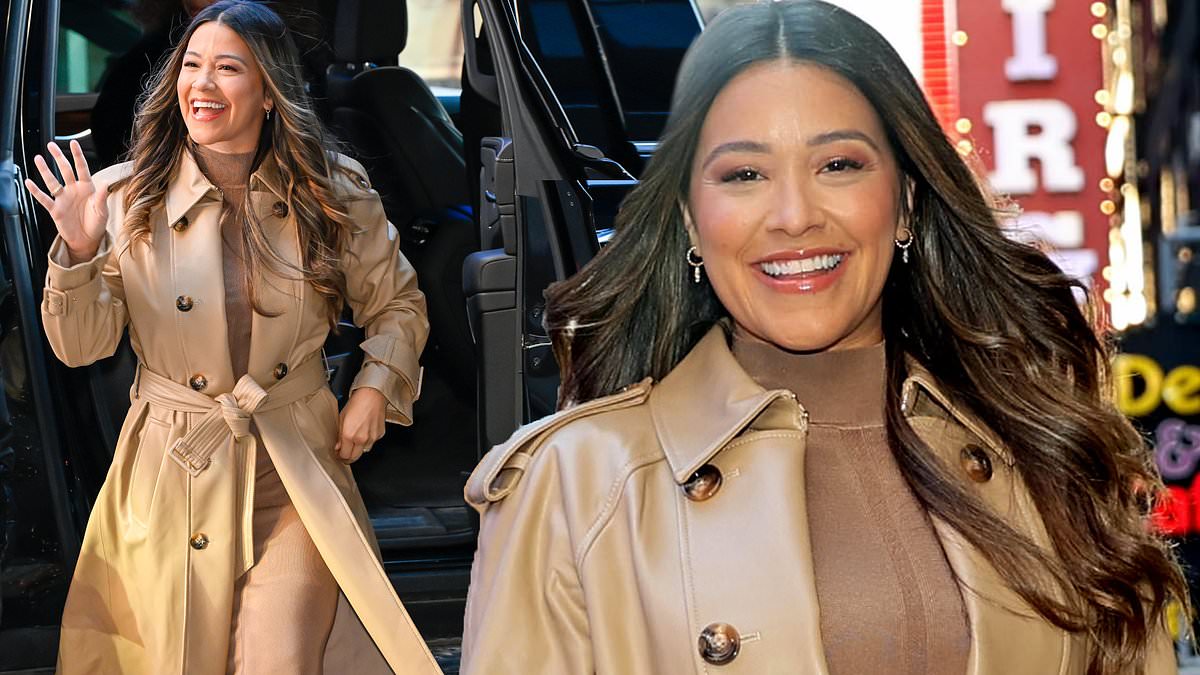 alert-–-gina-rodriguez-looks-stylish-in-a-beige-coat-over-a-nude-dress-before-chatting-up-her-show-not-dead-yet-on-gma-where-she-announces-season-two