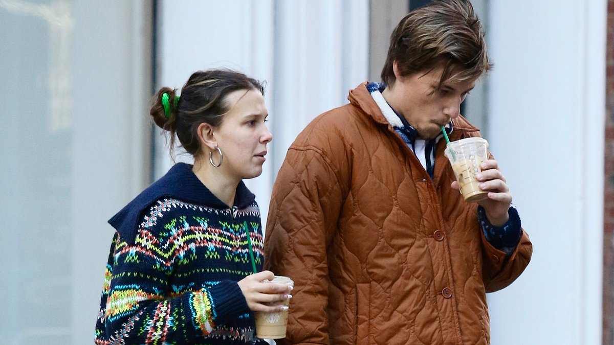 alert-–-millie-bobby-brown-is-20!-the-stranger-things-star-holds-hands-with-her-fiance-jake-bongiovi-as-they-enjoy-iced-coffees-in-nyc