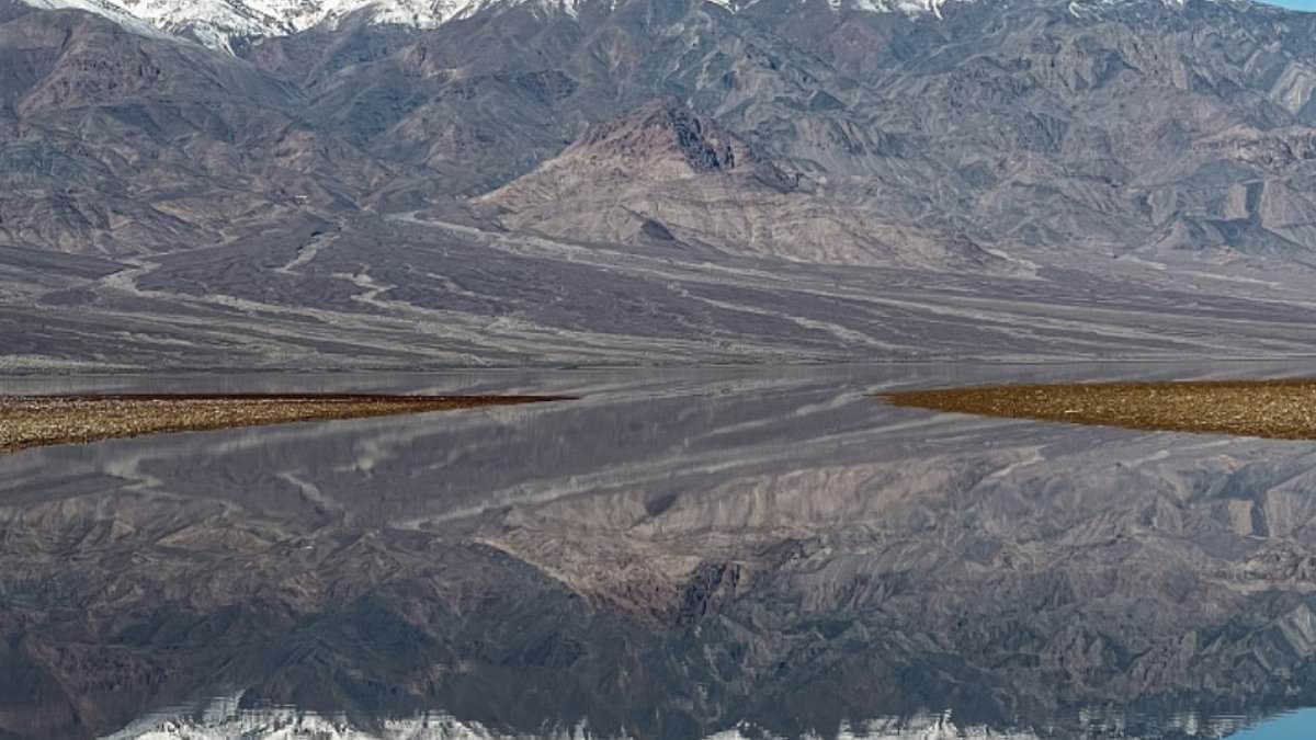 alert-–-death-valley-comes-to-life:-‘once-in-a-lifetime’-storms-create-temporary-lake-at-california-hot-spot-with-one-now-deep-enough-to-kayak-in