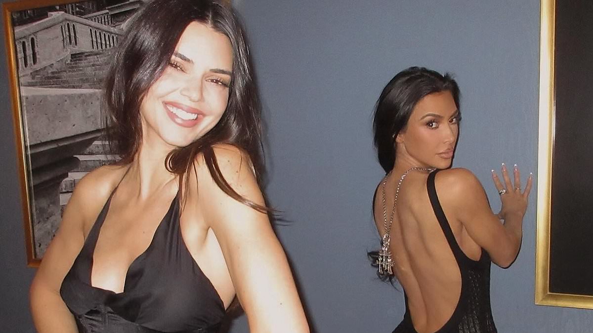 alert-–-kim-kardashian-poses-up-a-storm-in-a-sexy-backless-dress-as-she-wows-alongside-sister-kendall-jenner