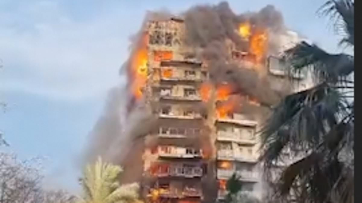 alert-–-huge-fire-breaks-out-at-block-of-flats-in-valencia:-desperate-residents-climb-down-balconies-as-flames-engulf-multistorey-building-in-spanish-port-city