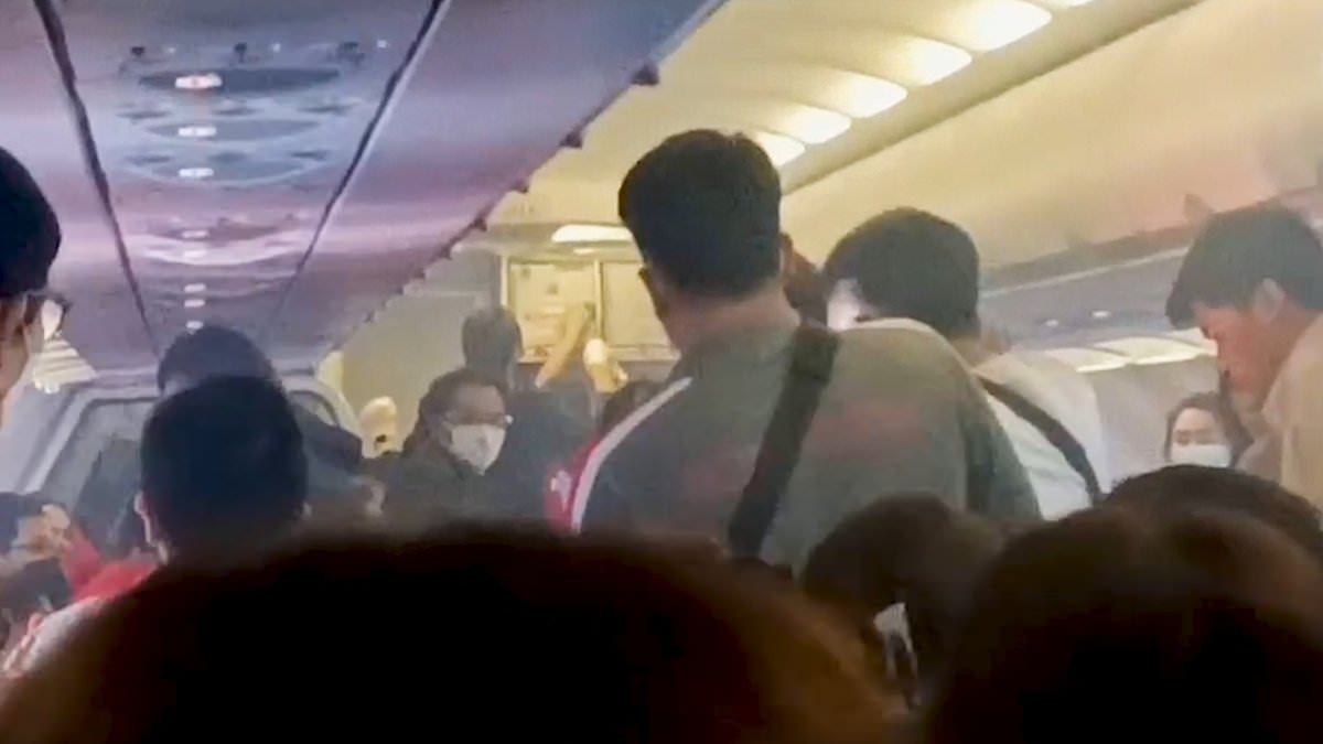 alert-–-terrifying-moment-power-bank-explodes-on-plane-–-sending-flames-and-smoke-through-cabin-and-sparking-mid-air-passenger-panic-on-airasia-flight-in-thailand