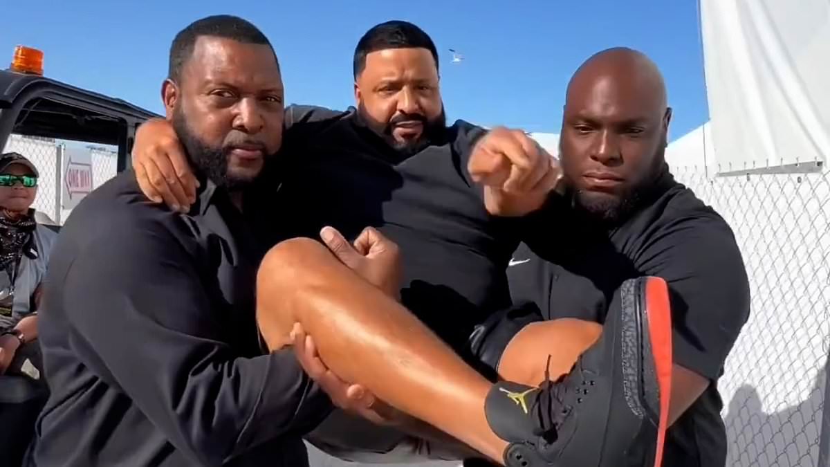 alert-–-dj-khaled-insists-on-being-carried-from-his-car-to-the-stage-by-two-bodyguards-for-miami-beach-gig-as-he-refuses-to-dirty-his-jordans-–-as-fans-slam-the-rapper’s-‘rich-ignorance’