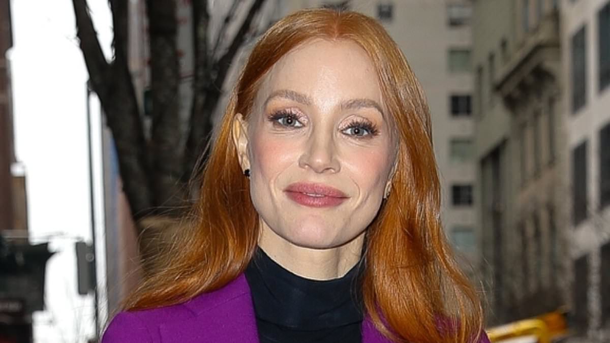 alert-–-jessica-chastain-is-effortlessly-radiant-in-an-eye-catching-purple-suit-as-she-enjoys-an-outing-in-rainy-new-york-city