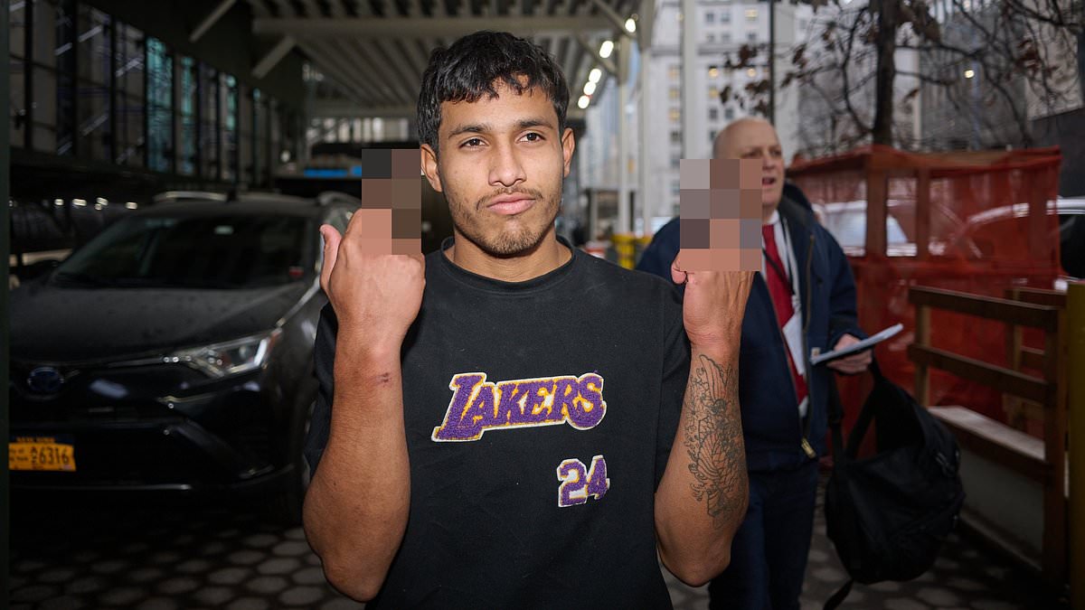 alert-–-nyc-migrant,-22,-who-brazenly-flipped-off-bystanders-outside-court-when-he-was-arrested-for-attack-on-times-square-police-officers-is-exonerated-after-he-was-misidentified