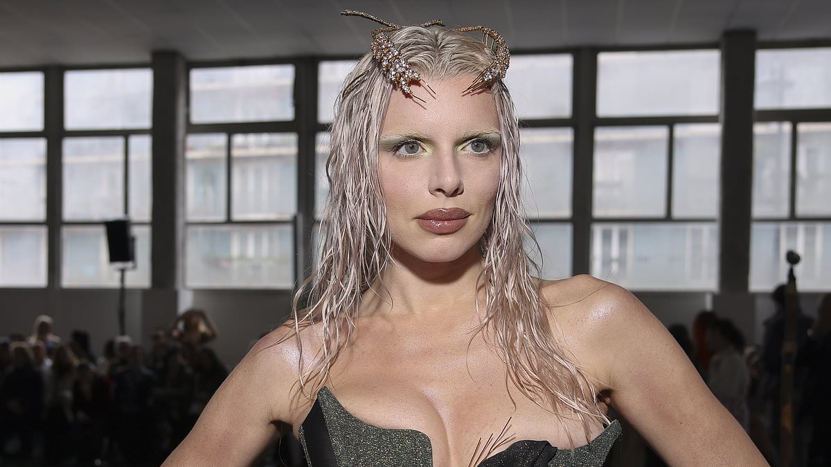 alert-–-julia-fox-wears-a-corset-gown-with-quirky-headdress-and-body-glitter-as-she-joins-barbara-palvin-at vivienne-westwood-paris-fashion-week-show