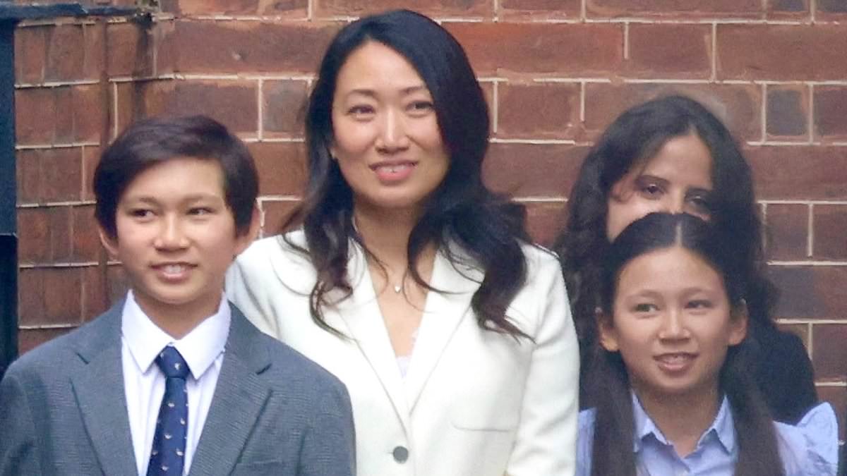 alert-–-jeremy-hunt’s-wife-and-children-make-a-rare-public-appearance-as-they-watch-the-chancellor-hold-up-his-red-budget-box-outside-downing-street