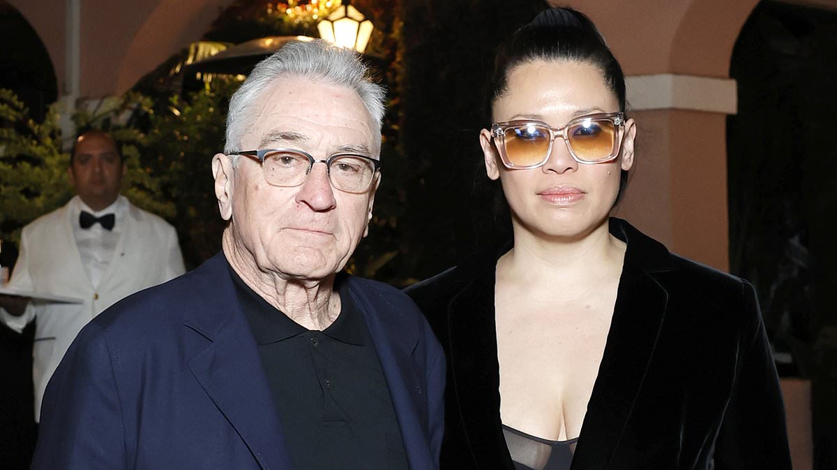 alert-–-robert-de-niro,-80,-looks-smart-in-a-blue-blazer-while-girlfriend-tiffany-chen,-45,-puts-on-a-busty-display-in-a-mesh-bra-at-chanel-pre-oscar-dinner-party-in-beverly-hills