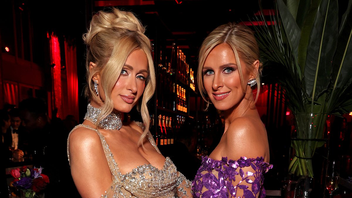 alert-–-paris-hilton-and-her-sister-nicky-hilton-both-opt-for-gorgeous-sheer-and-shimmering-gowns-as-they-heat-up-the-2024-vanity-fair-oscars-party