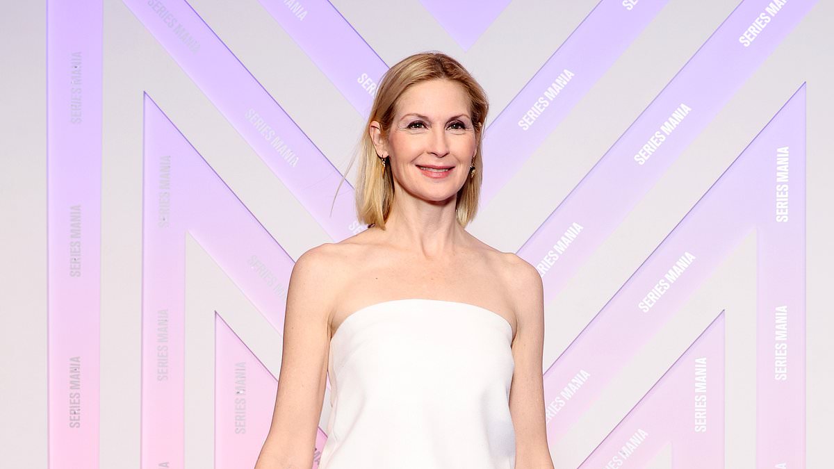 alert-–-gossip-girl-icon-kelly-rutherford,-55,-cuts-a-glamorous-figure-in-a-quirky-white-frilled-dress-as-she-attends-the-series-mania-festival-in-france