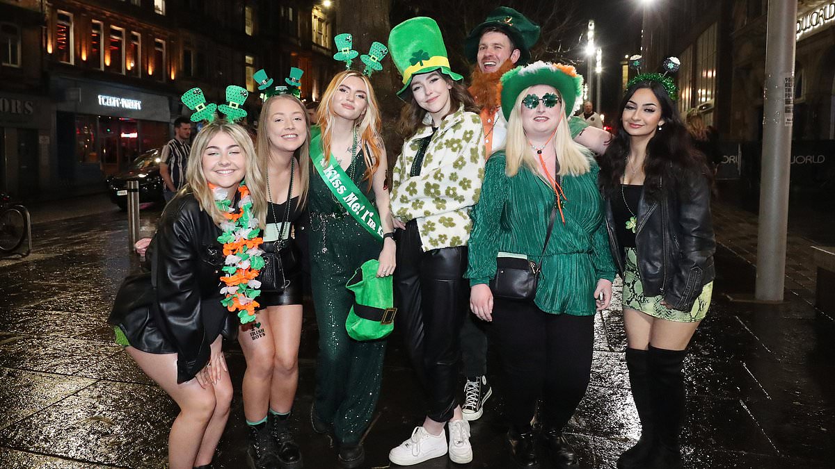 alert-–-paint-the-town-green!-boozy-revellers-clad-in-shamrocks,-guinness-hats-and-suspenders-pack-the-streets-of-britain-as-they-celebrate-the-night-before-st-patrick’s-day