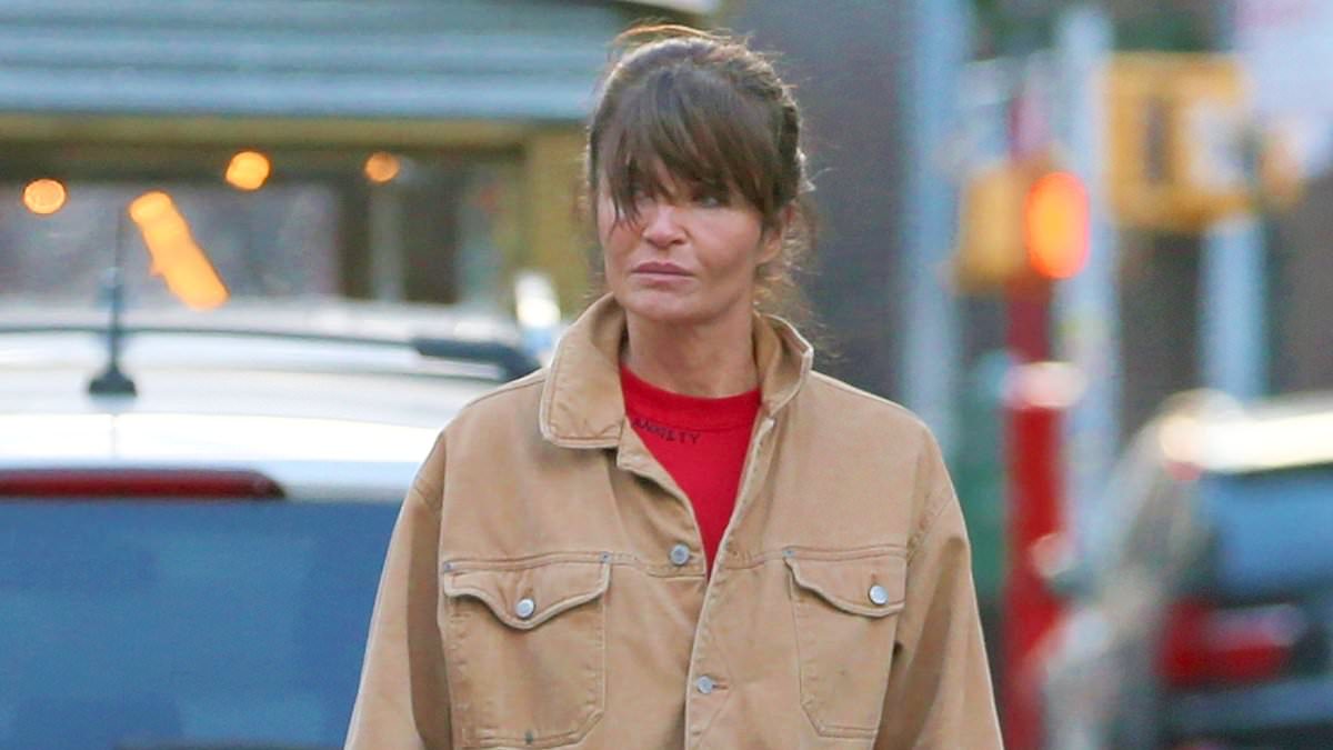 alert-–-helena-christensen-keeps-it-casual-in-an-oversized-jacket-and-jeans-while-taking-her-dog-kuma-for-a-walk-in-new-york-city