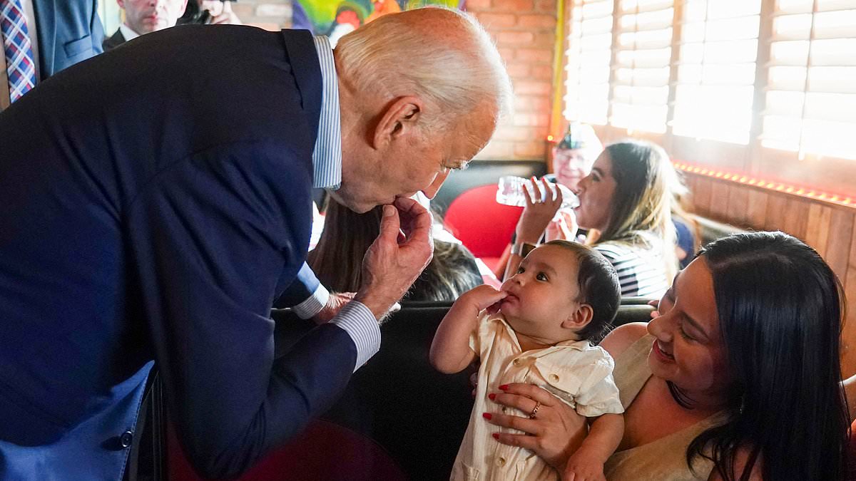 alert-–-president-biden,-81,-bizarrely-wanders-off-stage-as-he-is-being-introduced-at-phoenix-diner-to-pull-faces-at-a-baby-telling-guests-he-‘couldn’t-resist’-–-as-another-tot-can’t-hide-their-boredom