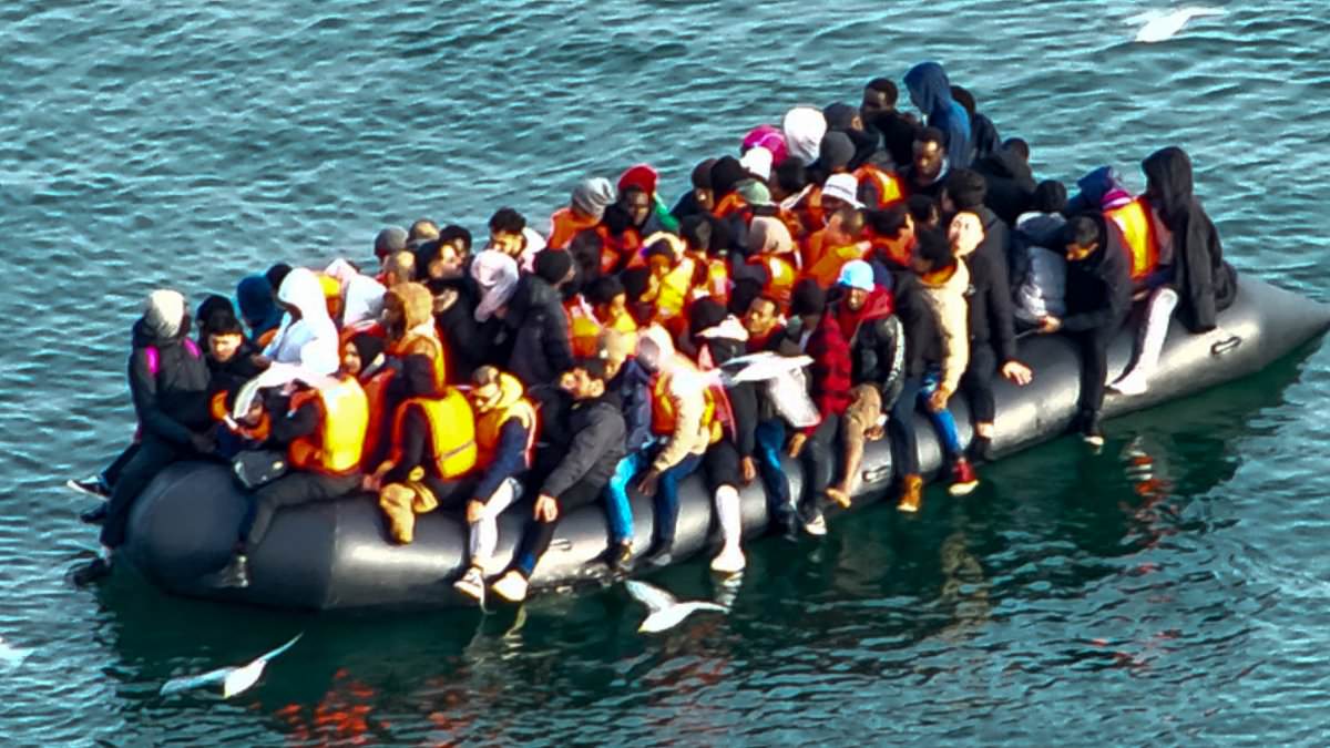 alert-–-moment-overloaded-boat-carrying-dozens-of-uk-bound-migrants-including-babies-motors-away-from-french-coastguard-and-into-shipping-lane-off-calais-–-as-rnli-and-british-border-forces-join-rescue-bid