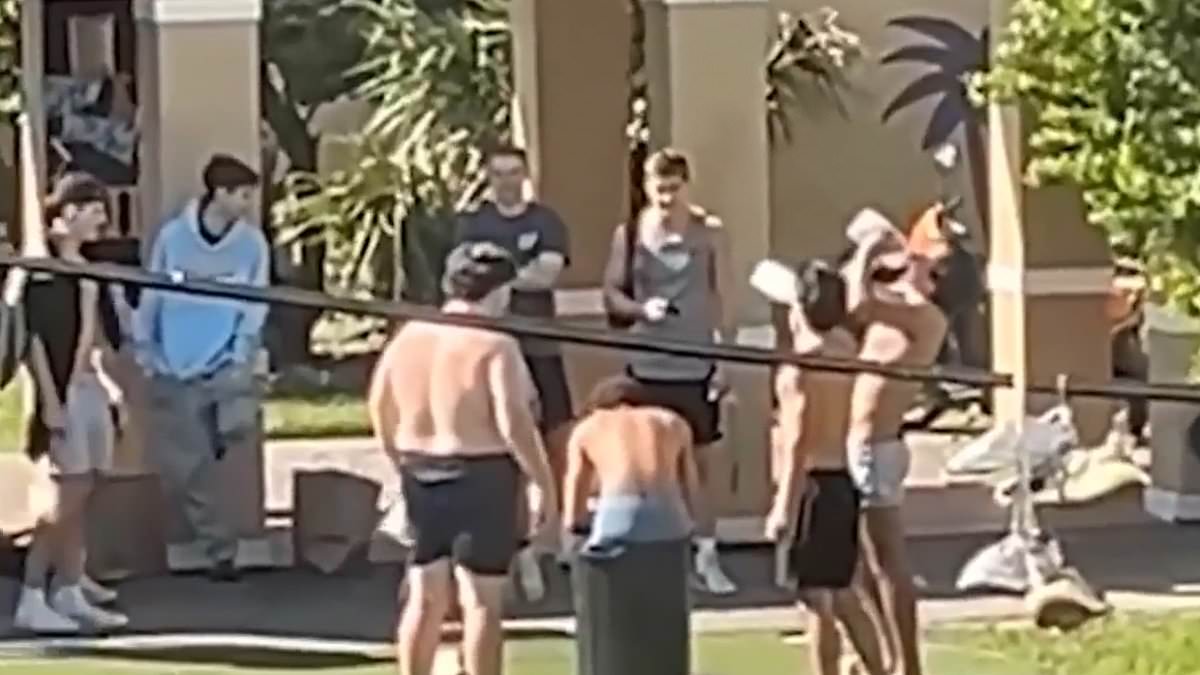 alert-–-university-of-miami-fraternity-suspended-after-hazing-ritual-with-students-seen-chugging-down-milk-until-they-throw-up-on-a-member-sitting-in-a-garbage-bin