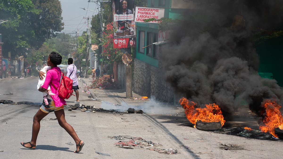 alert-–-gunmen-roam-haiti’s-peaceful-neighborhoods-and-smash-down-doors-in-bloody-pre-dawn-raids-led-by-twisted-gangs-–-as-us-rushes-to-fly-more-americans-home-while-island-nation-teeters-on-the-edge