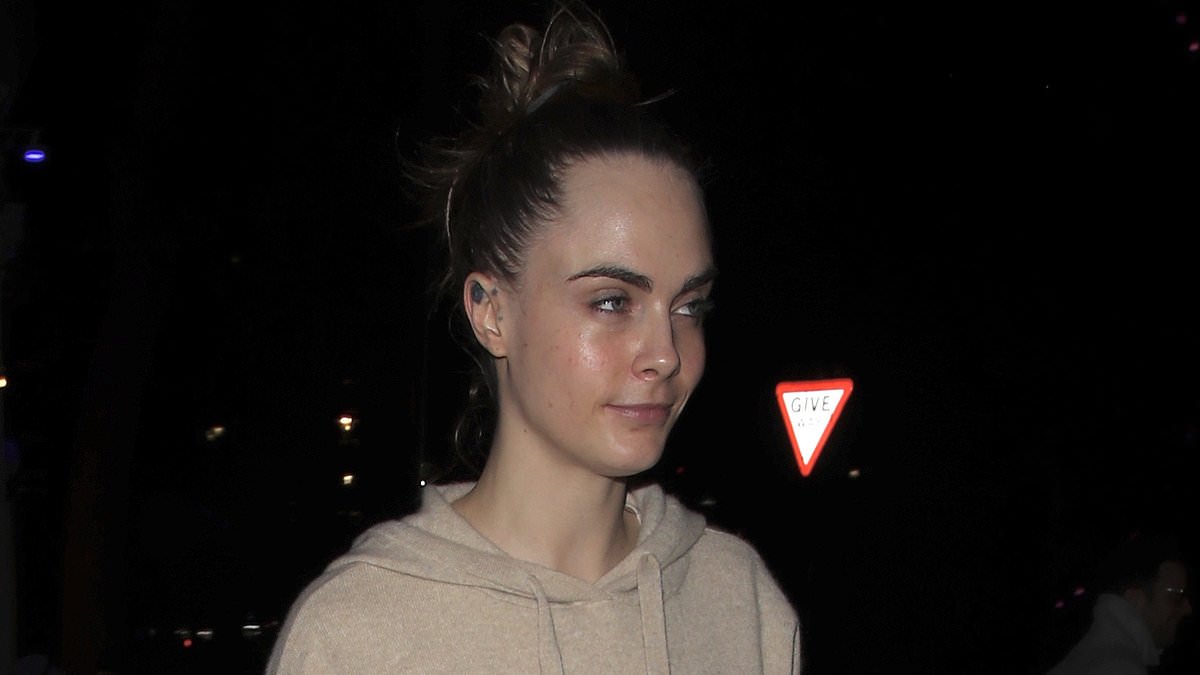 alert-–-cara-delevingne-cuts-a-casual-figure-in-a-tracksuit-and-ugg-boots-as-she-poses-for-selfies-with-fans-after-her-latest-performance-in-cabaret