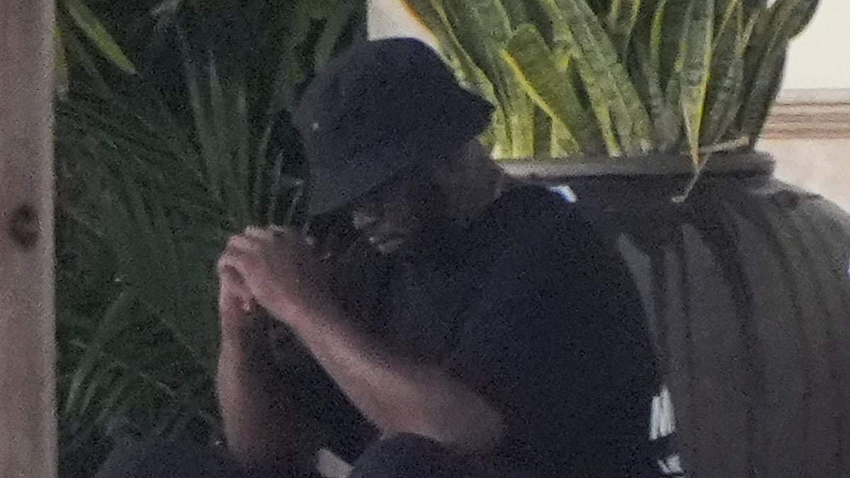 alert-–-diddy-looks-tense-as-he-sits-outside-his-miami-mansion…-amid-mounting-lawsuits-and-sex-trafficking-probe