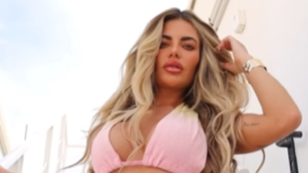 alert-–-megan-barton-hanson-sets-pulses-racing-in-pink-bikini-top-and-cut-out-trousers-as-she-poses-for-photoshoot