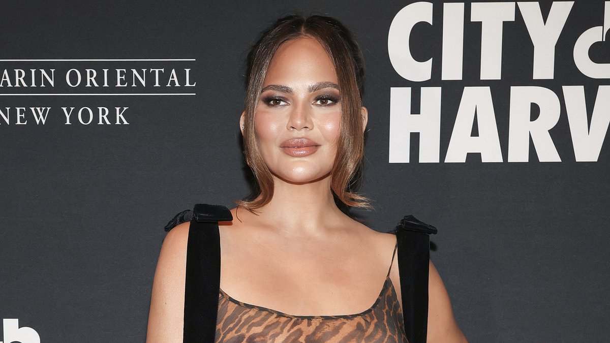 alert-–-chrissy-teigen’s-most-daring-look-yet!-star-goes-braless-under-very-sheer-cheetah-dress-while-attending city-harvest-gala-in-ny-with-husband-john-legend