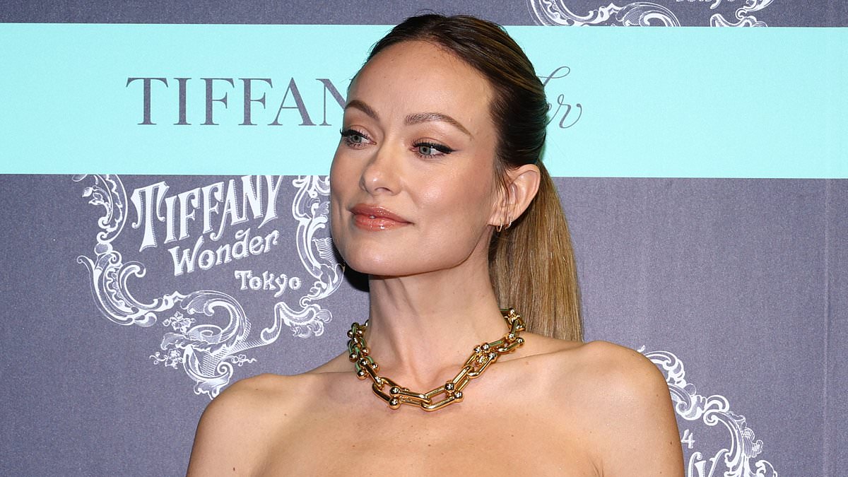 alert-–-olivia-wilde-cuts-a-racy-display-in-a-backless-cut-out-dress-as-she-attends-tiffany-&-co’s-new-exhibition-in-tokyo