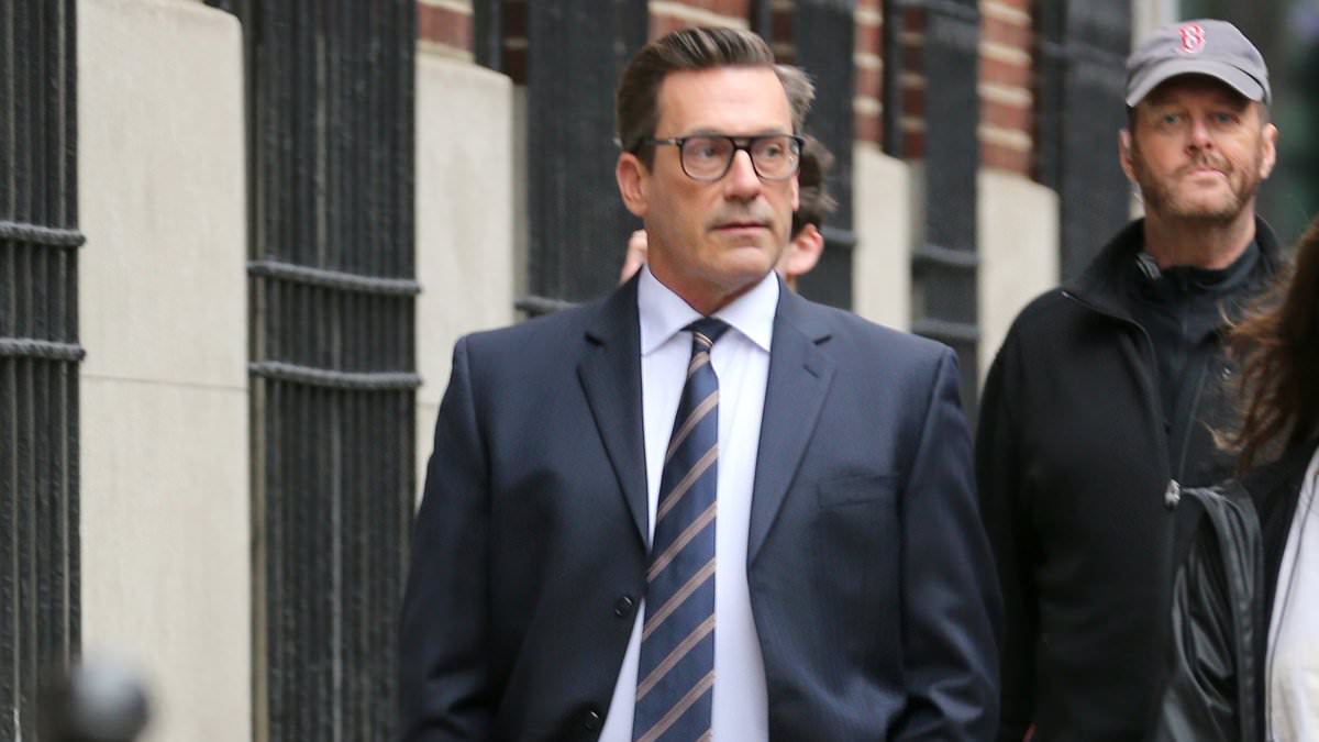 alert-–-jon-hamm-harks-back-to-his-mad-men-days-as-he-cuts-a-dapper-figure-in-black-suit-while-filming-the-series-your-friends-and-neighbors-in-nyc