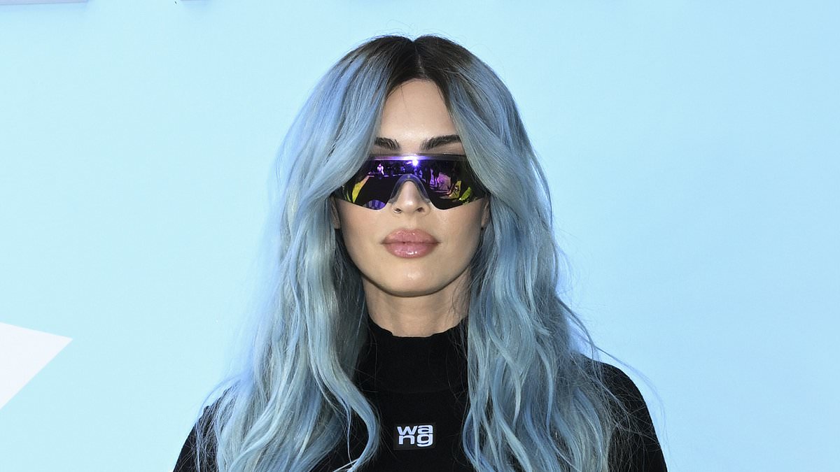 alert-–-megan-fox-sizzles-in-a-lbd-and-blue-hair-alongside-stylish-emma-roberts-as-they-lead-stars-at-the-revolve-festival-during-coachella-weekend