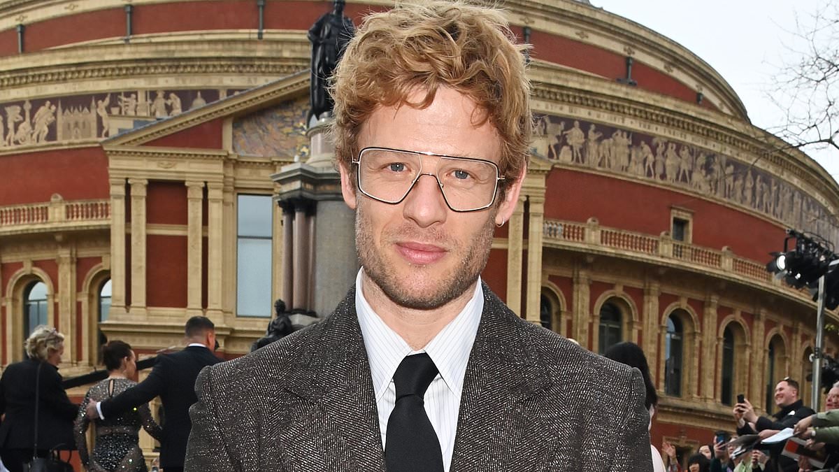 alert-–-2024-olivier-awards:-james-norton-cuts-a-quirky-figure-in-a-brown-tweed-suit-and-aviator-glasses-as-he-attends-the-glitzy-ceremony