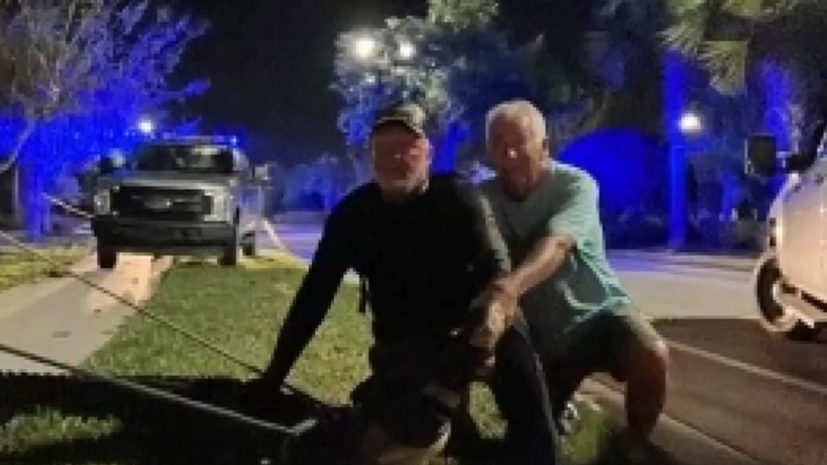 alert-–-hero-neighbor-saves-friend-from-certain-death-by-driving-over-11ft-alligator-that-had-clamped-onto-his-legs-and-was-dragging-him-by-the-feet-into-a-pond