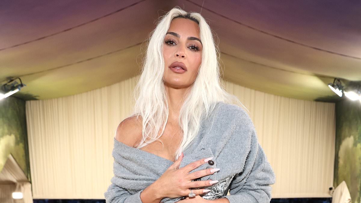 alert-–-kim-kardashian-explains-why-she-was-awkwardly-holding-a-gray-sweater-over-her-chest-at-the-met-gala-(and-it-has-to-do-with-a-‘wild’-night-with-an-ex!)