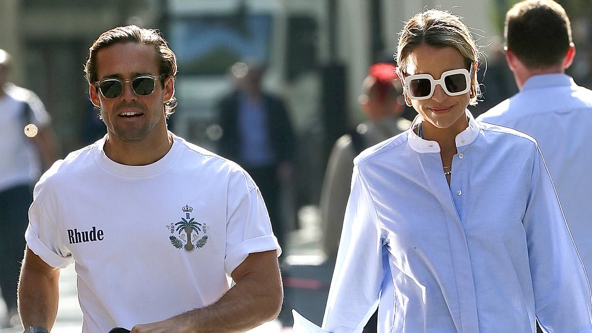 alert-–-vogue-williams-flashes-her-long-legs-in-tiny-white-shorts-as-she-and-ripped-husband-spencer-matthews-grab-their-helmets-to-ride-around-sunny-london