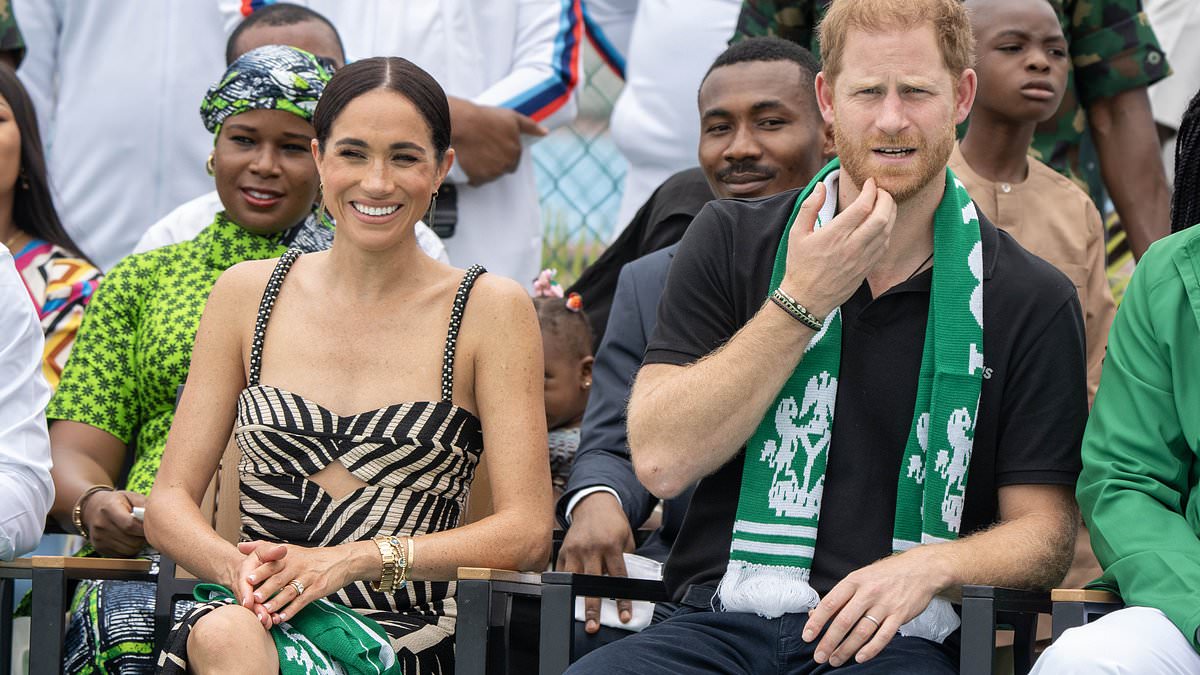 alert-–-meghan-delights-locals-as-she-poses-for-selfies-on-‘quasi-royal’-african-tour-while-prince-harry-enjoys-volleyball-with-wounded-soldiers-–-as-fans-say-‘the-whole-country-melted’-when-duchess-revealed-her-nigerian-heritage