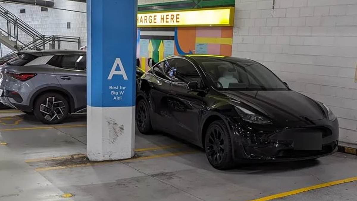 alert-–-tesla-driver-is-slammed-over-‘entitled’-parking-act-at-a-busy-shopping-centre-in-queensland