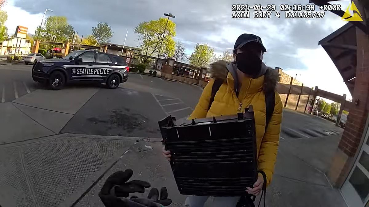 alert-–-outrageous-moment-brazen-shoplifting-couple-wander-out-of-store-with-cash-register-and-run-straight-into-police-officer-in-dem-run,-crime-ravaged-seattle