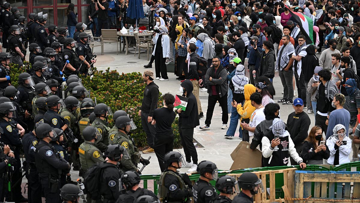 alert-–-university-of-california-is-inundated-with-hundreds-of-anti-israel-protestors-who-set-up-barricades-across-campus-before-facing-off-with-cops-as-12-people-are-arrested