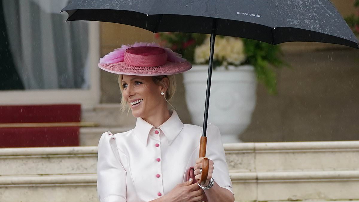 alert-–-zara-tindall-channels-eliza-doolittle-in-a-stylish-1500-dress-with-pink-buttons-and-a-fascinator-as-she-shields-under-an-umbrella-to-support-cousin-william-at-buckingham-palace-garden-party