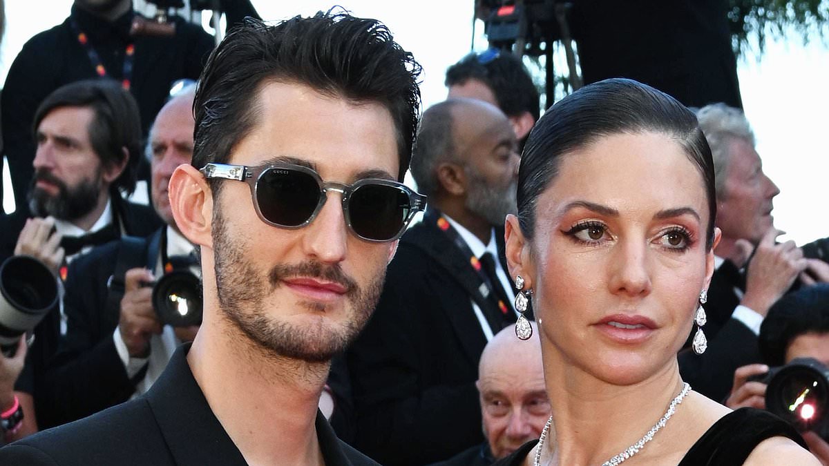 alert-–-australian-actress-natasha-andrews-bares-her-cleavage-in-a-very-low-cut-dress-as-she-packs-on-the-pda-with-french-actor-boyfriend-pierre-niney-on-the-cannes-red-carpet