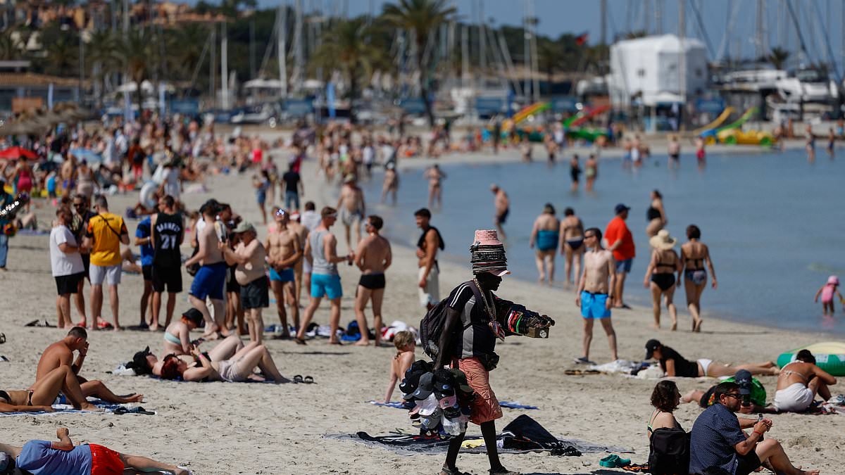 alert-–-thousands-of-demonstrators-gather-in-mallorca-to-protest-against-‘excessive-tourism’-which-has-inflated-property-prices,-driven-up-the-cost-of-living-and-created-traffic-chaos