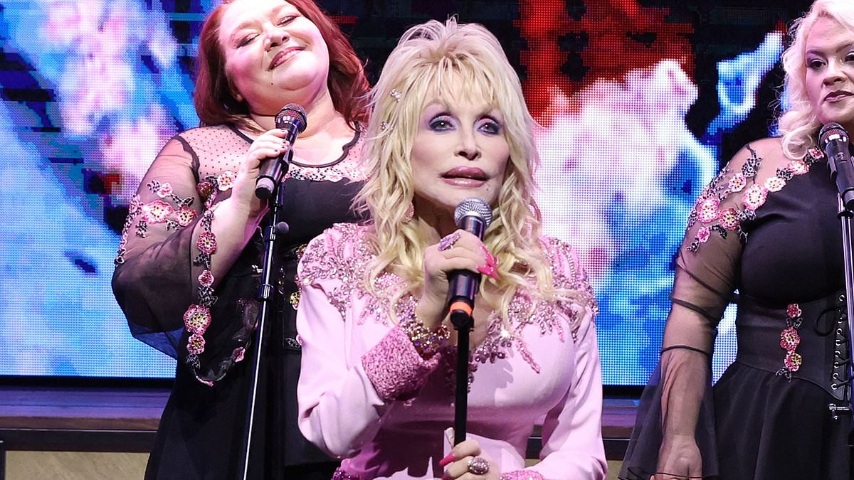 alert-–-dolly-parton,-78,-looks-pretty-in-pink-as-she-attends-the-ribbon-cutting-ceremony-for-the-dolly-parton-experience-in-tennessee