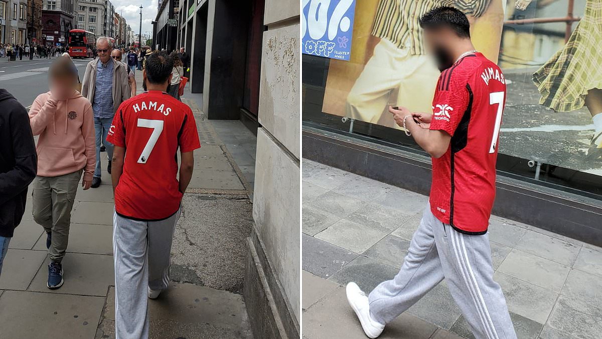 alert-–-disgust-as-football-fan-in-no-7-manchester-united-top-with-hamas-printed-on-the-back-parades-through-london-as-police-launch-hunt-for-man