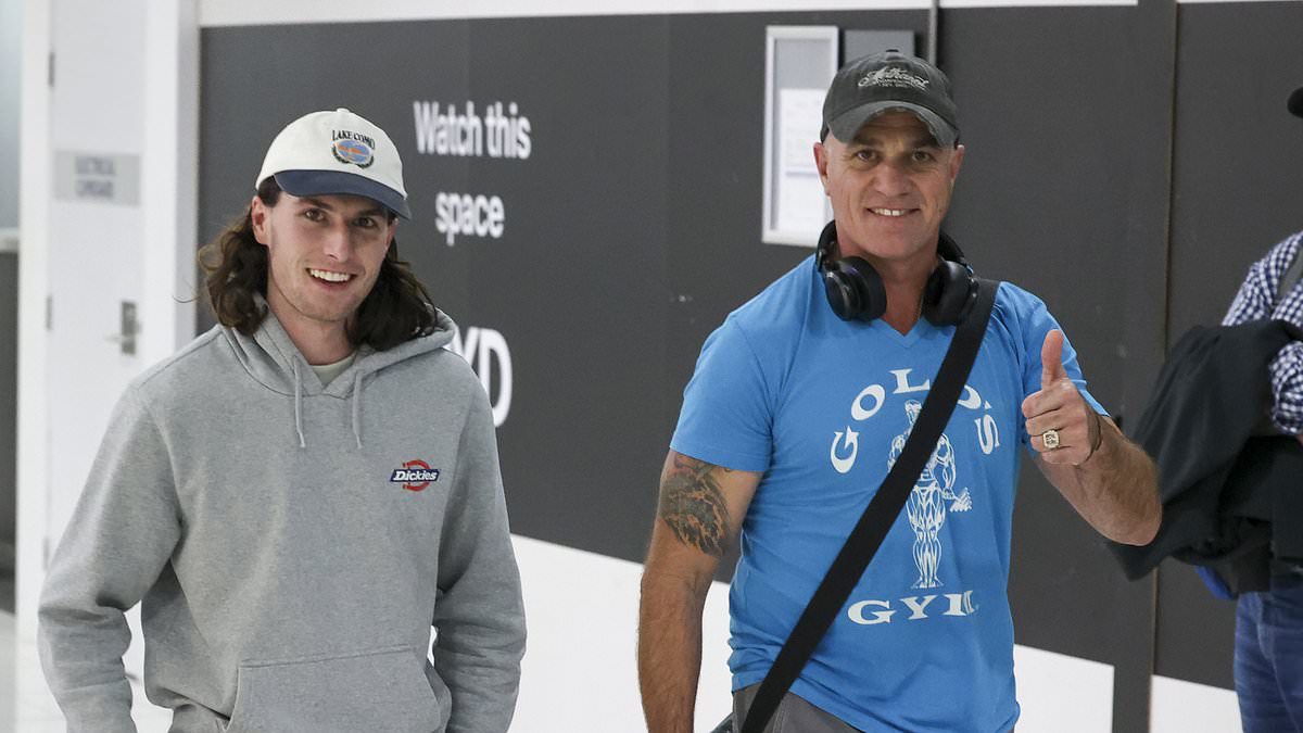 alert-–-all-grown-up!-muscular-shannon-noll-strolls-through-sydney-airport-with-musician-son-blake,-21,-as-father-son-duo-tour-together