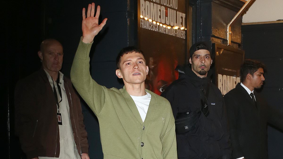 alert-–-tom-holland-is-swarmed-by-crowds-of-adoring-fans-as-he-leaves-the-theatre-following-a-performance-of-romeo-&-juliet-on-the-west-end