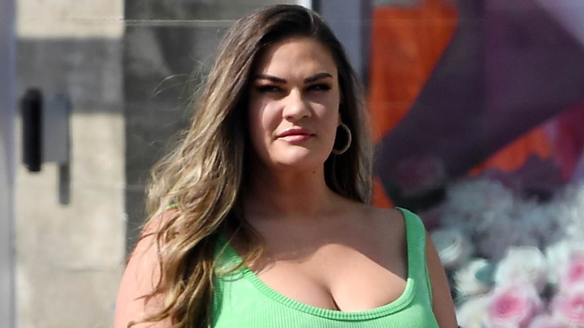 alert-–-brittany-cartwright-showcases-her-curves-and-puts-on-a-busty-display-in-a-sporty-green-romper-for-a-stroll-with-a-male-pal-to-the-west-hollywood-pride-festival-parade