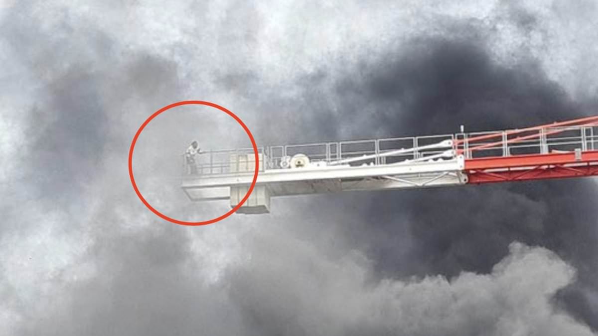 alert-–-revealed:-crane-operator-seen-struggling-in-cloud-of-thick-smoke-after-fire-at-east-london-building-site-is-recovering-in-hospital-after-being-rescued-and-treated-for-shock-and-smoke-inhalation