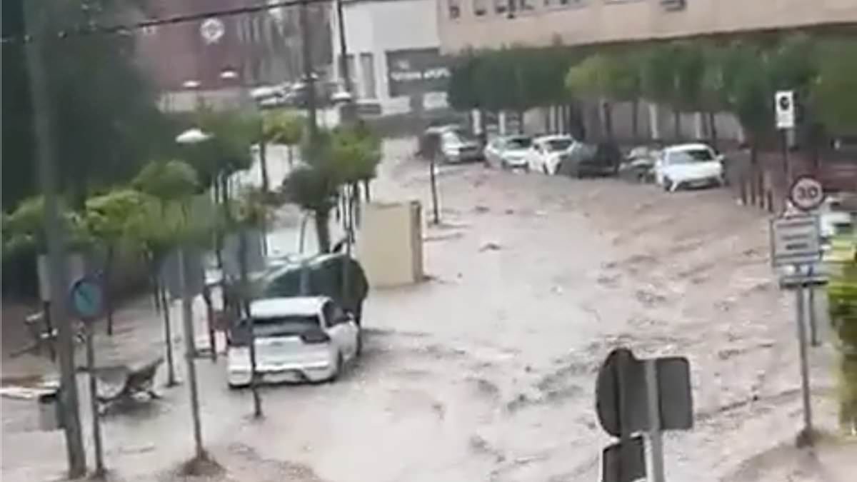 alert-–-the-rain-in-spain-does-not-go-down-the-drain!-floods-hit-costa-blanca-region-popular-with-holidaymakers,-with-fast-flowing-water-washing-cars-along-the-streets…-as-brits-prepare-to-fly-out-on-holiday